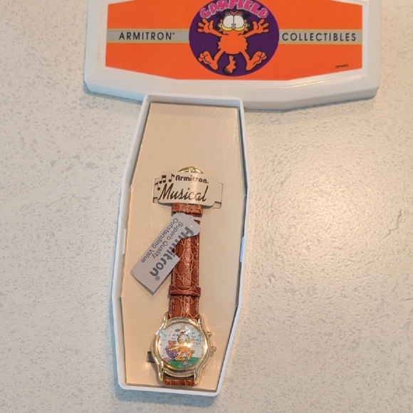 Armitron Other - Armitron Musical Watch with Gold Case and Brown Strap